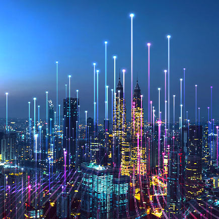 A cityscape with tall buildings and unique architecture